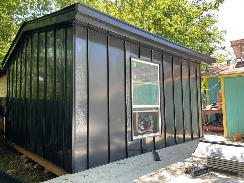 Black standing seam metal wall panels for Metal Roof Installation in Sheboygan