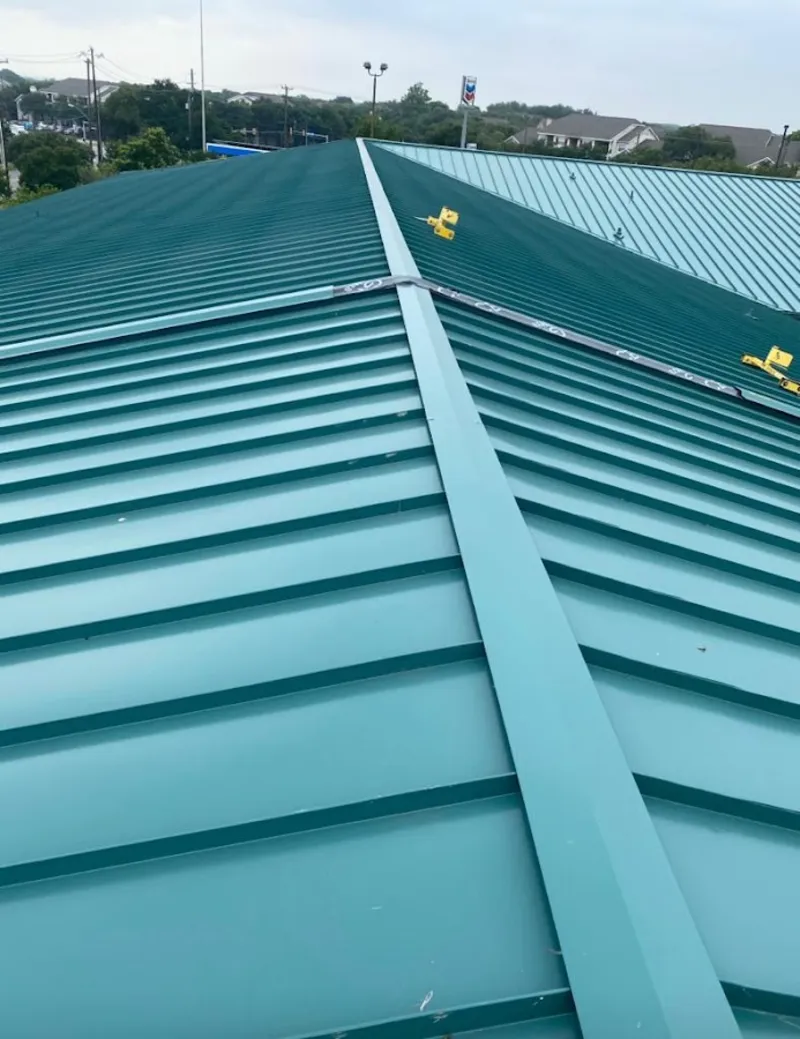 Green commercial metal roof ridge and valley for Metal Roof Repair in Sheboygan